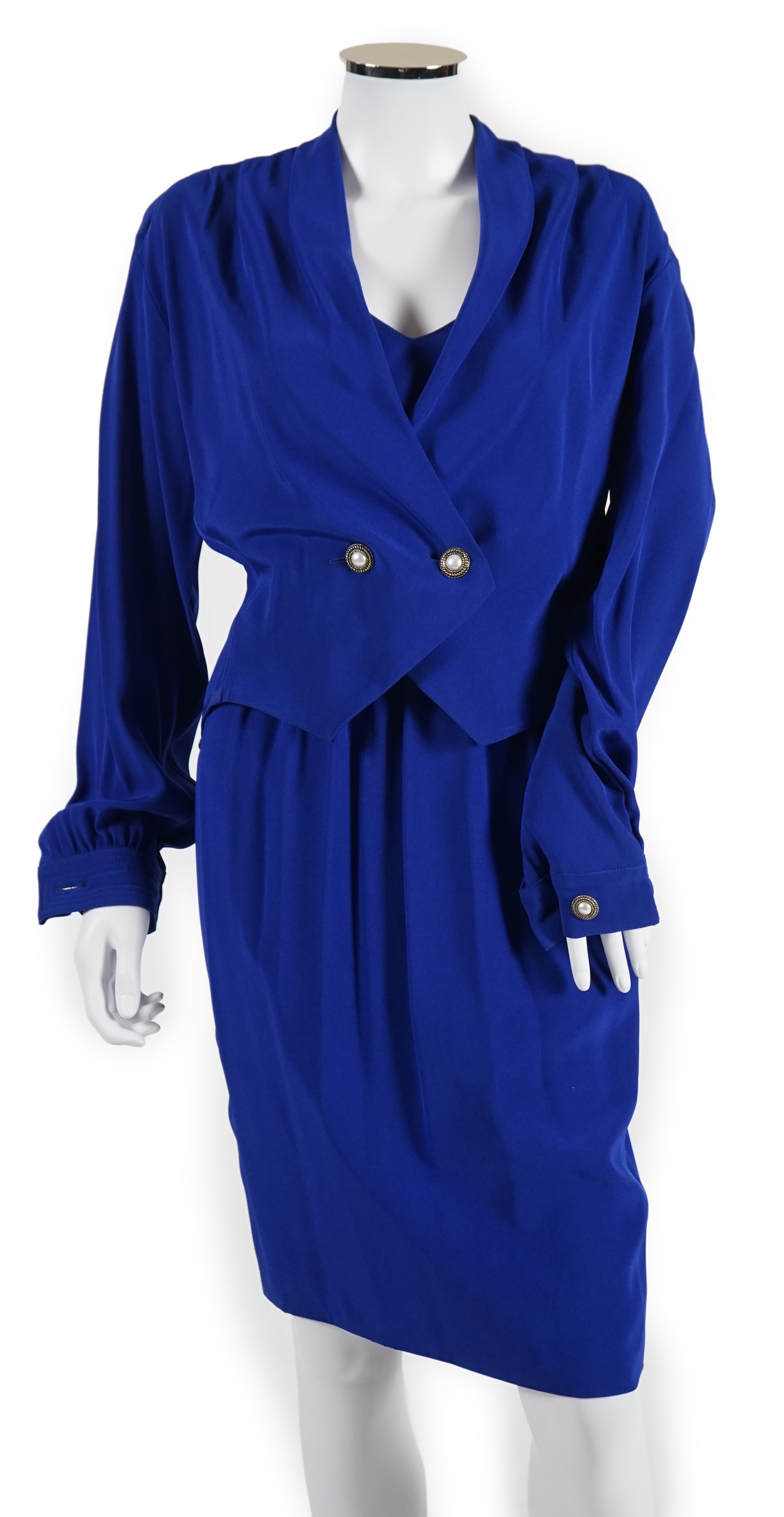 A matching Pallant silk skirt and blouse, a royal blue dress and matching bolero style jacket and black straight skirt and cream jacket. Approx sizes 8-12 Proceeds to Happy Paws Puppy Rescue